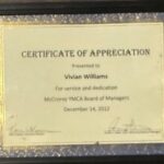 Victoria williams receives a certificate of appreciation.