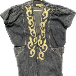 A denim jacket with gold embroidery on it.