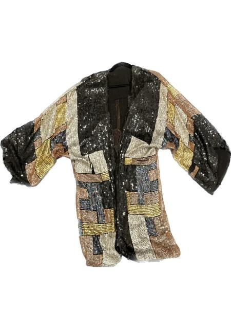A multicolored jacket with sequins on it.