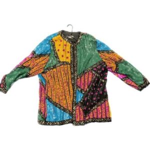 A colorful jacket hanging on a hanger.