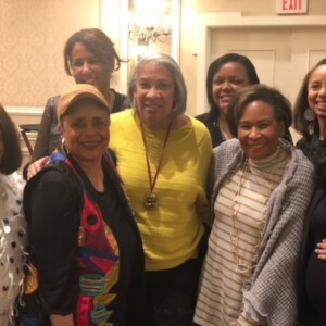 A group of women posing for a photo.