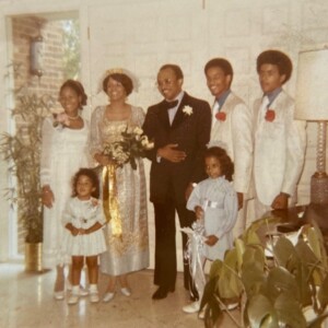 An old photo of a family posing for a picture.