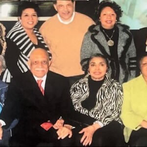 A group of older people posing for a photo.